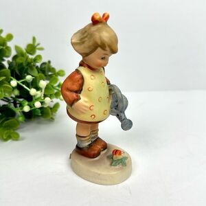 Goebel Hummel “Little Gardener"
Girl with Watering Can Figurine Vtg W. Germany